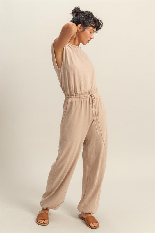 Chic back keyhole jumpsuit with cap sleeves and a drawstring waist for a stylish and comfortable look.