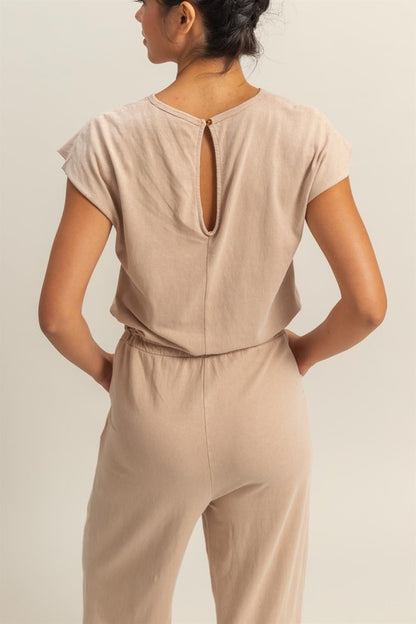 Chic back keyhole jumpsuit with cap sleeves and a drawstring waist for a stylish and comfortable look.