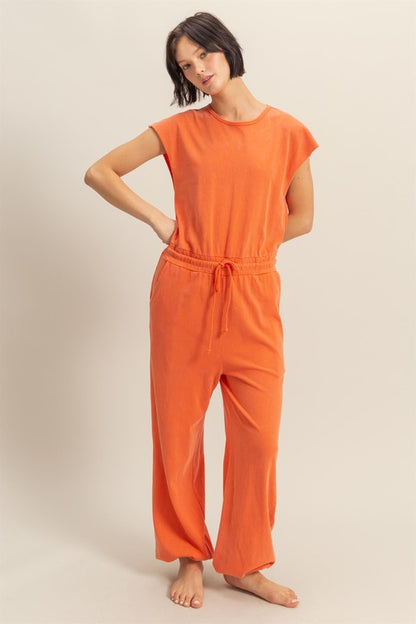 Back keyhole round neck cap sleeve drawstring jumpsuit with a flattering fit and pockets for effortless style and comfort.