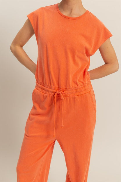 Back keyhole round neck cap sleeve drawstring jumpsuit with a flattering fit and pockets for effortless style and comfort.