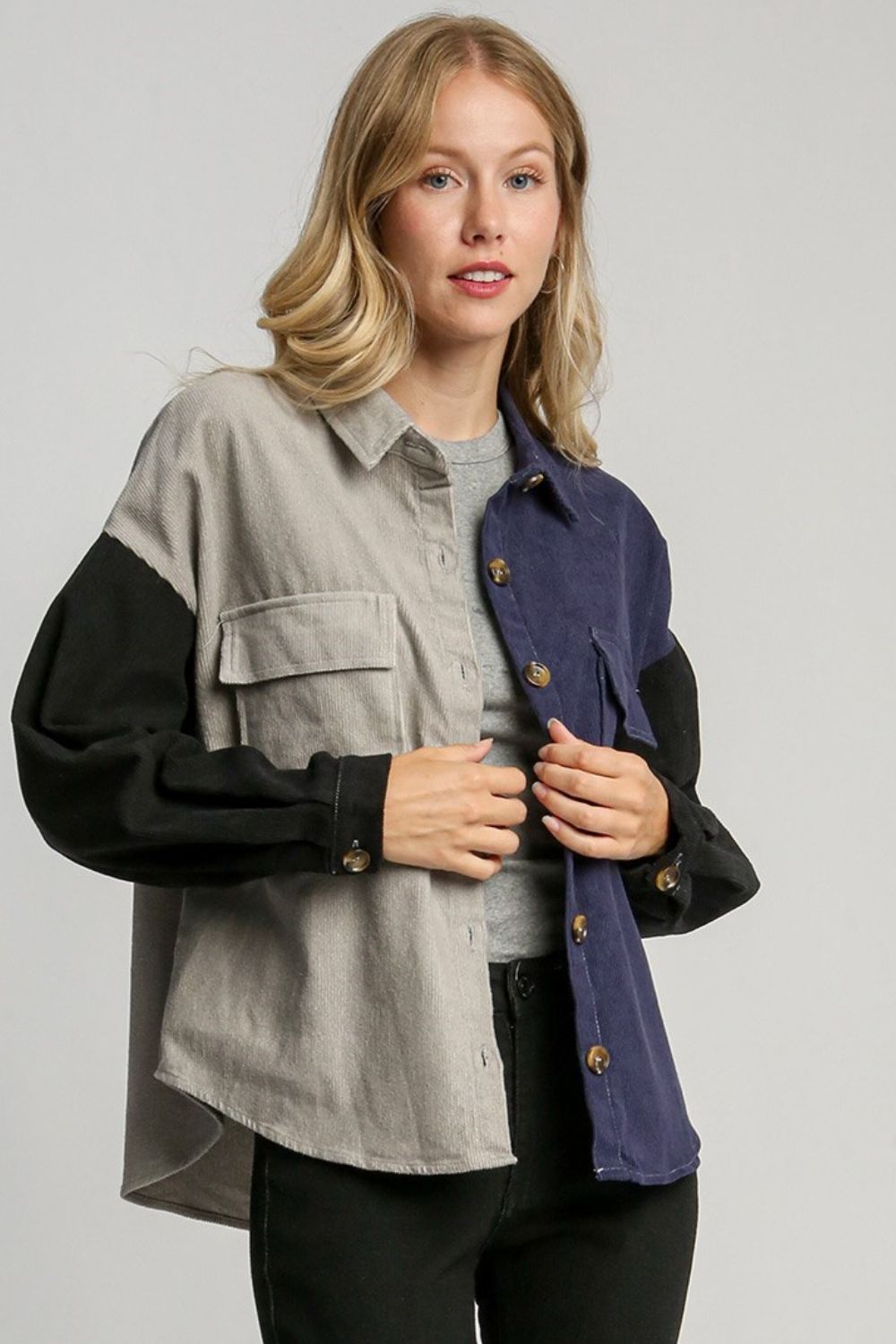 Trendy full-size color block button-down jacket with a modern design, featuring functional pockets and a comfortable fabric blend.