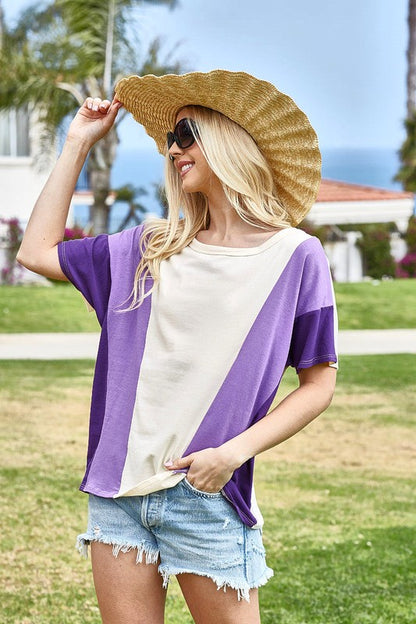 Stylish color block short sleeve t-shirt with a modern design, perfect for casual and trendy outfits.