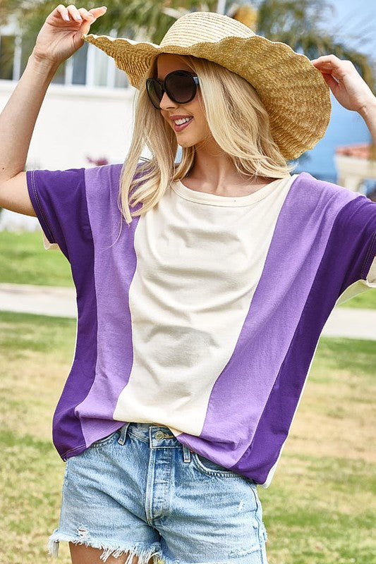 Stylish color block short sleeve t-shirt with a modern design, perfect for casual and trendy outfits.