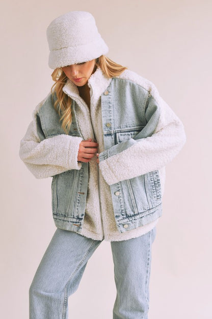 Stylish denim washed drop shoulder sherpa jacket with a faux two-piece effect, perfect for a cozy and trendy layered look.