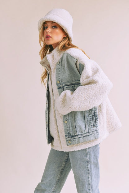 Stylish denim washed drop shoulder sherpa jacket with a faux two-piece effect, perfect for a cozy and trendy layered look.