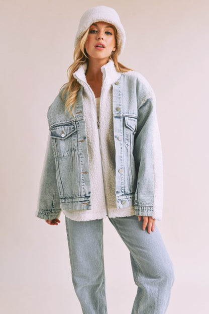 Stylish denim washed drop shoulder sherpa jacket with a faux two-piece effect, perfect for a cozy and trendy layered look.