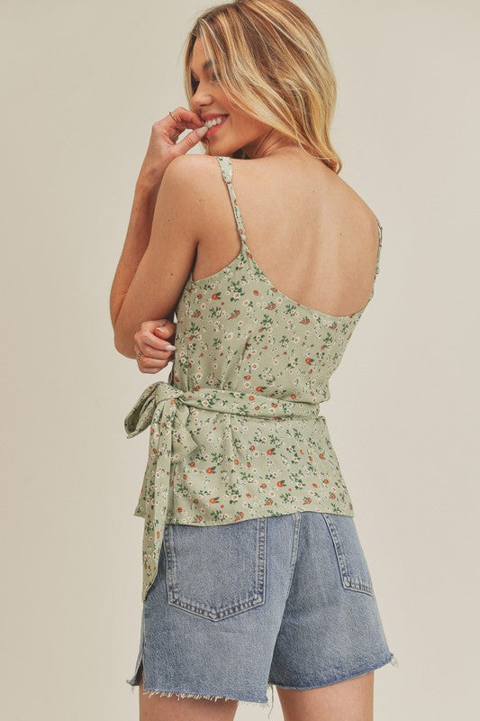 Chic ditsy floral surplice adjustable straps cami with a feminine and elegant design.