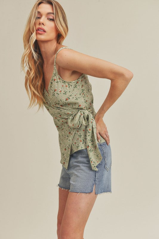 Chic ditsy floral surplice adjustable straps cami with a feminine and elegant design.