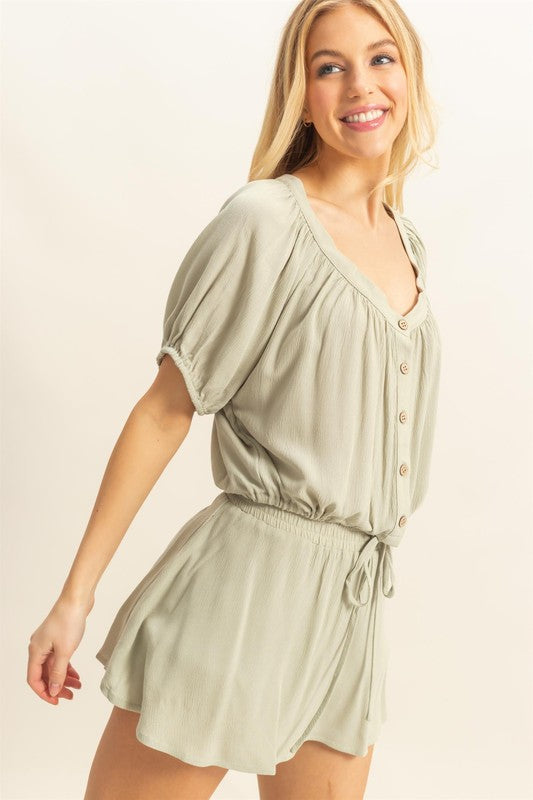 Trendy drawstring hem short sleeve top & matching skort set, perfect for casual and stylish everyday wear.