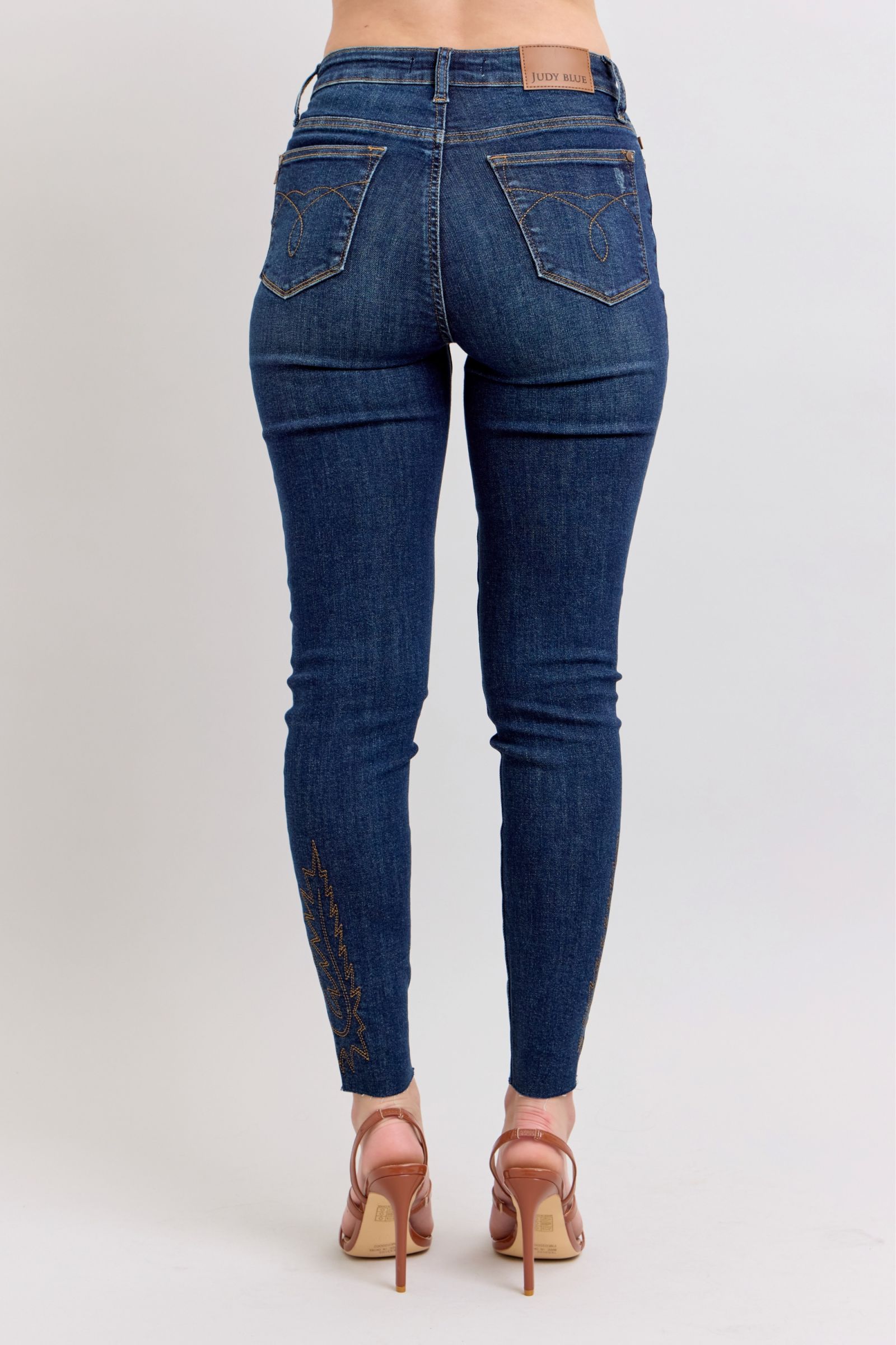 Full size embroidered high-rise skinny jeans with a flattering fit and stylish embroidery details.