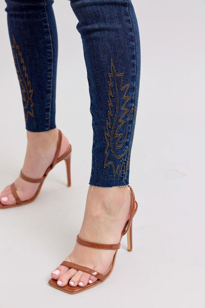 Full size embroidered high-rise skinny jeans with a flattering fit and stylish embroidery details.