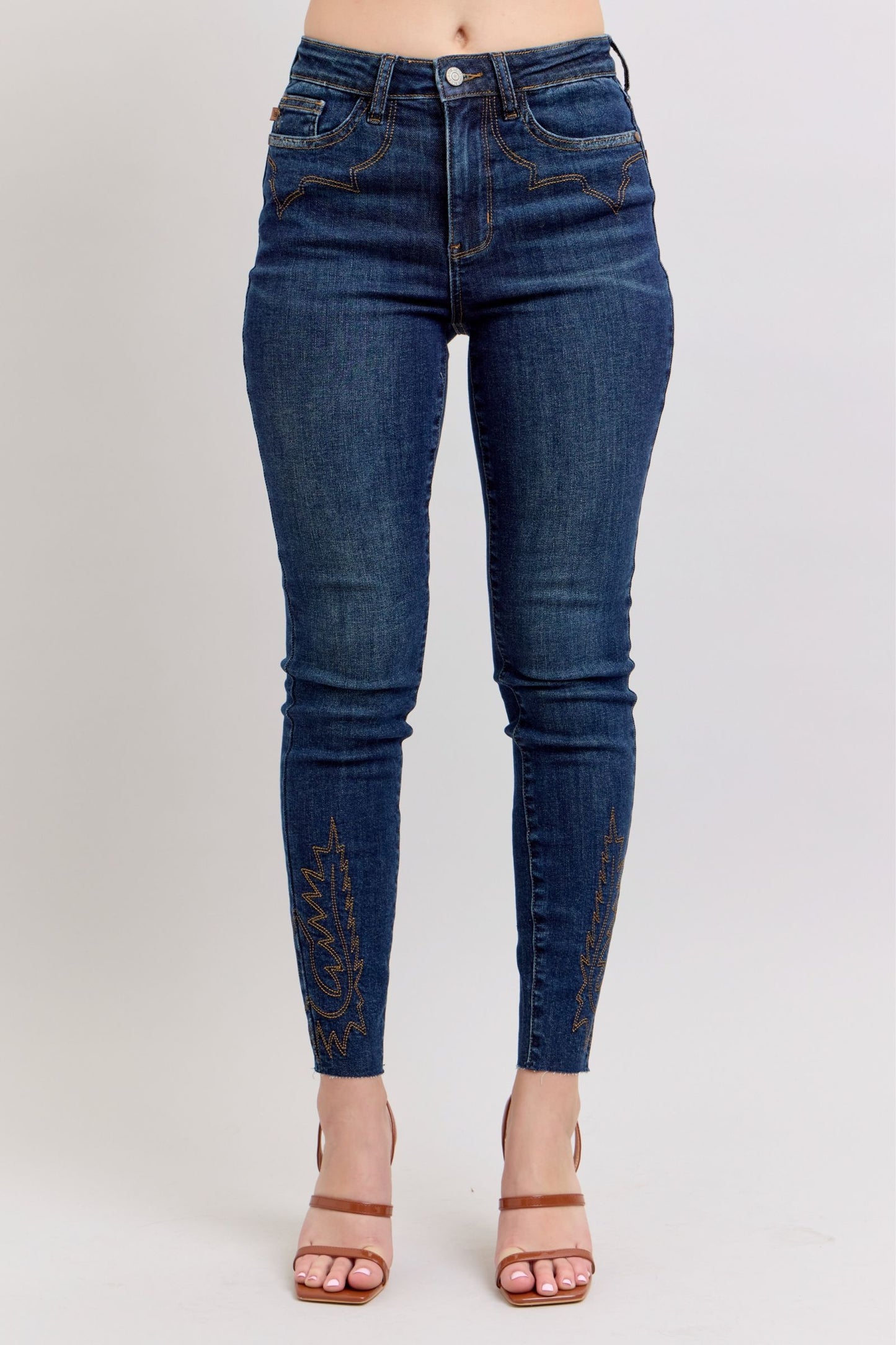 Full size embroidered high-rise skinny jeans with a flattering fit and stylish embroidery details.