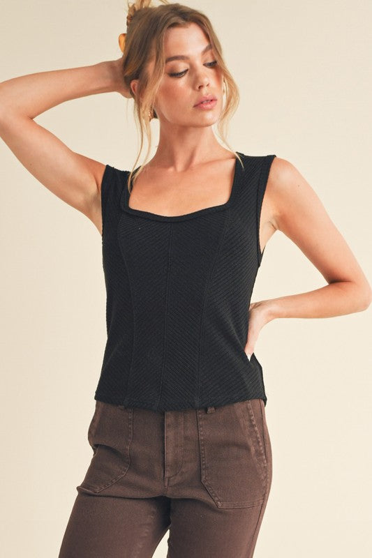 Women's exposed seam ribbed wide strap tank top with trendy detailing