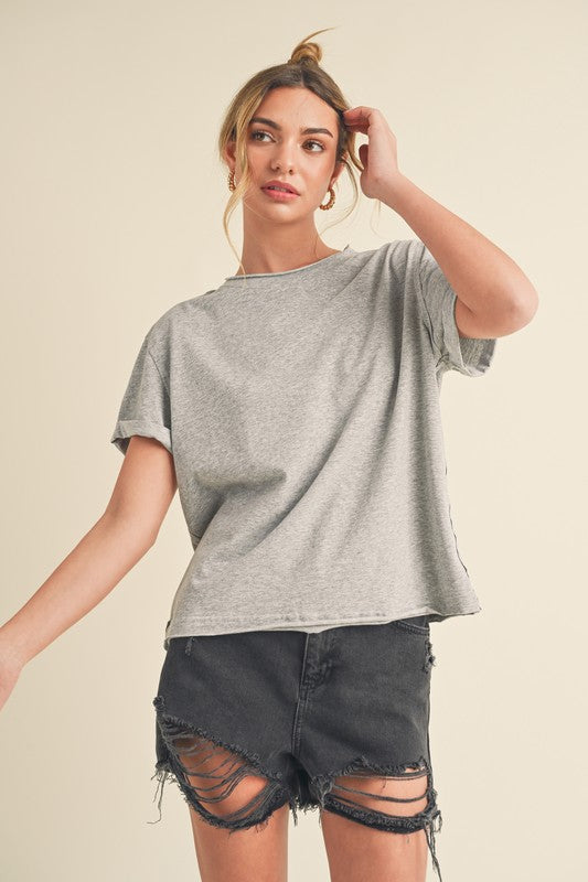 Women's exposed seam round neck short sleeve t-shirt – casual and edgy style