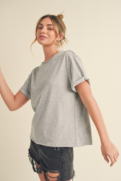 Women's exposed seam round neck short sleeve t-shirt – casual and edgy style