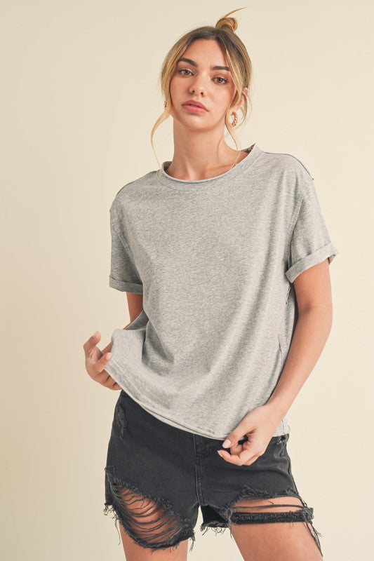 Women's exposed seam round neck short sleeve t-shirt – casual and edgy style