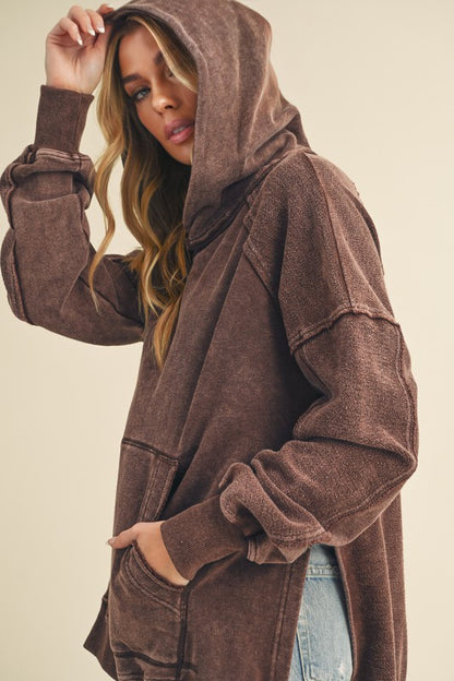 Women's exposed seam side slit hoodie with kangaroo pocket – casual and trendy everyday wear