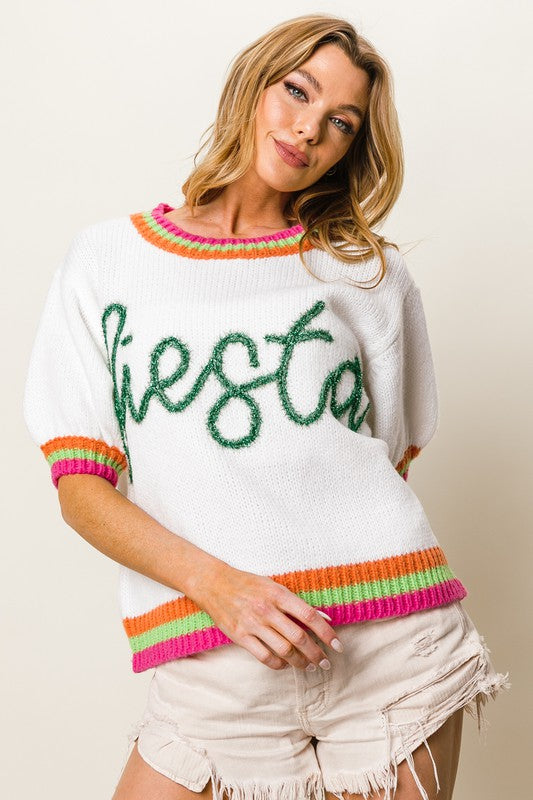 Stylish FIESTA metallic letter sweater with short puff sleeves, adding a bold and trendy touch to any outfit.