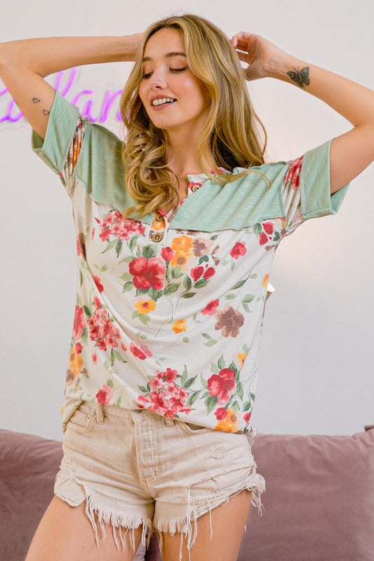 Cozy floral button detail round neck short sleeve terry t-shirt, perfect for casual and stylish everyday wear.