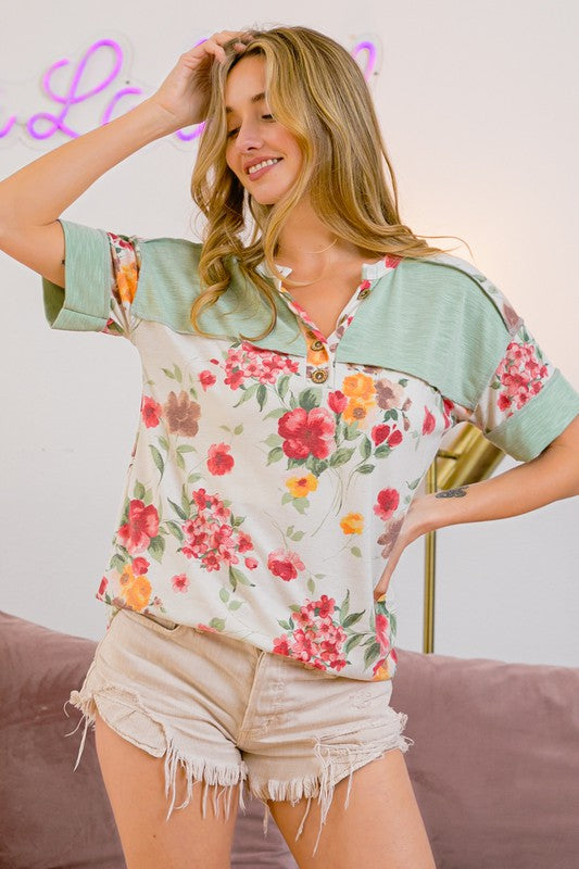 Cozy floral button detail round neck short sleeve terry t-shirt, perfect for casual and stylish everyday wear.