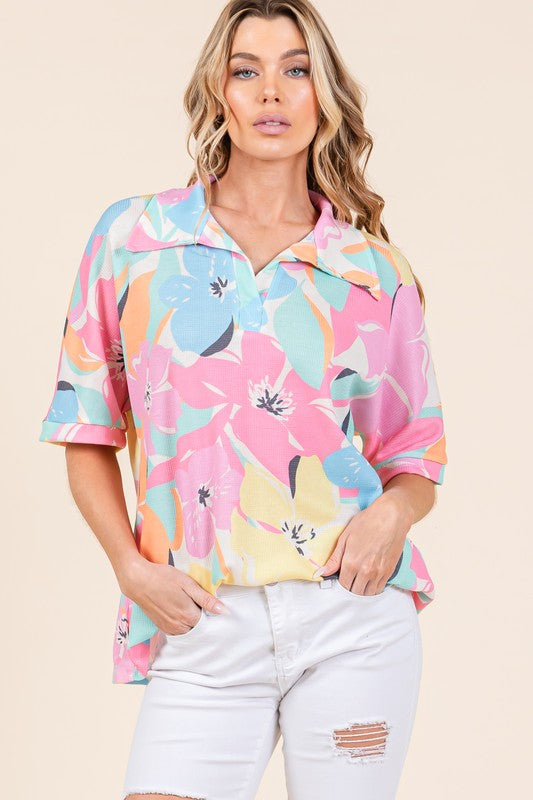 Stylish floral collared neck half sleeve top with a chic and feminine design, perfect for versatile styling.