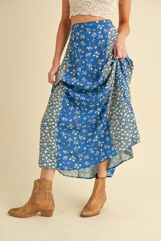 Elegant floral elastic waist maxi skirt with a flowy silhouette and a comfortable fit.