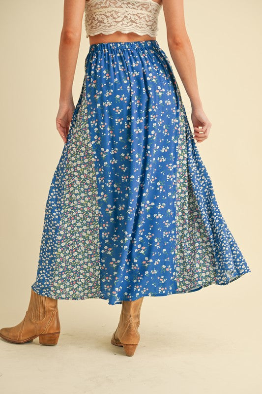 Elegant floral elastic waist maxi skirt with a flowy silhouette and a comfortable fit.