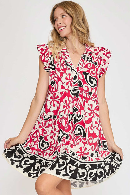 Elegant floral ruffled cap sleeve tiered dress with a flowy and feminine silhouette, perfect for a romantic and stylish look.