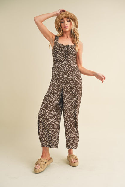 Elegant floral jumpsuit with a sweetheart neckline and wide-leg silhouette for a stylish and feminine look.