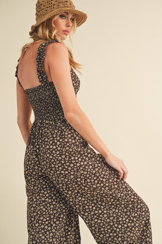 Elegant floral jumpsuit with a sweetheart neckline and wide-leg silhouette for a stylish and feminine look.