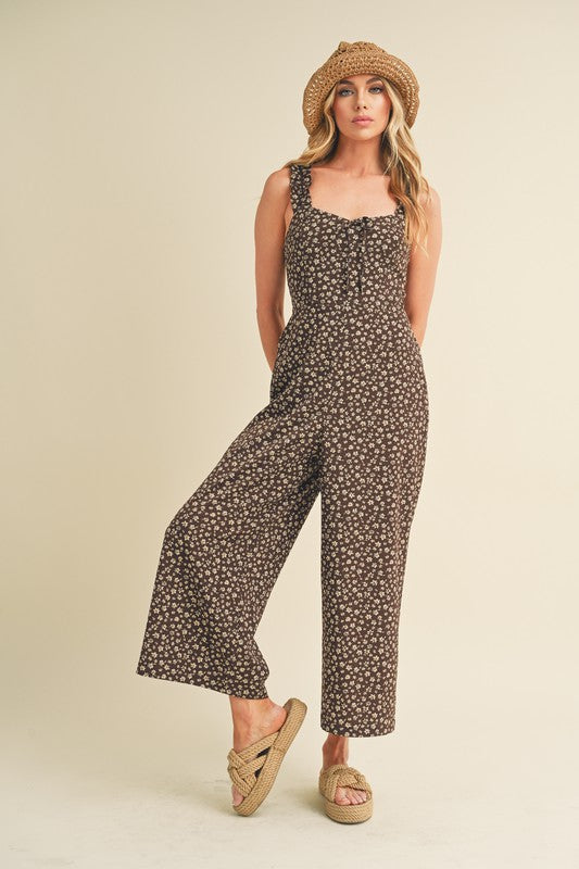 Elegant floral jumpsuit with a sweetheart neckline and wide-leg silhouette for a stylish and feminine look.