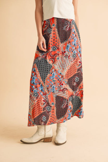 Stylish printed maxi skirt with a flowy silhouette, perfect for casual and dressy occasions.