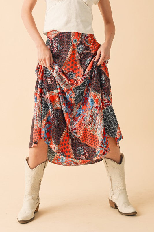 Stylish printed maxi skirt with a flowy silhouette, perfect for casual and dressy occasions.