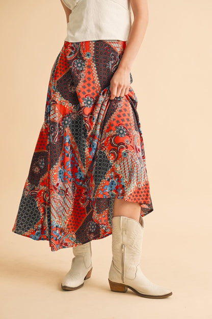 Stylish printed maxi skirt with a flowy silhouette, perfect for casual and dressy occasions.