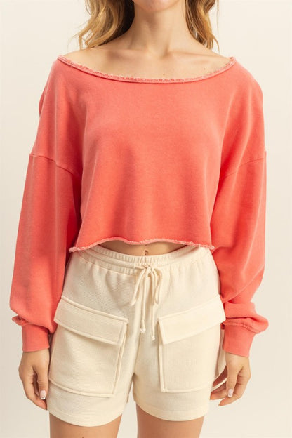 Frayed detail boat neck long sleeve crop top with raw edges, stylish & edgy for casual wear.