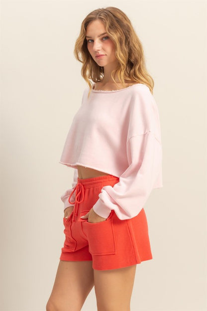 Women's frayed detail boat neck long sleeve crop top – trendy and edgy fashion piece