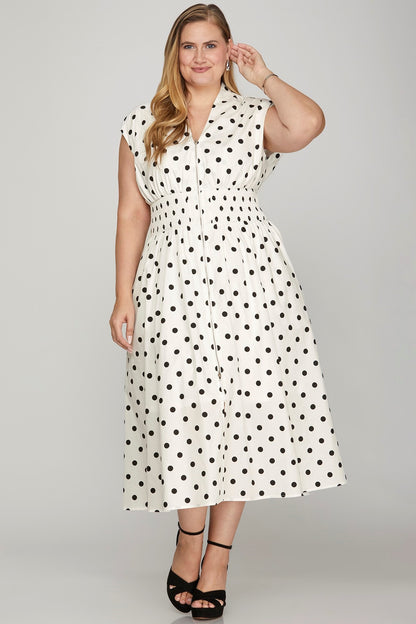 Front zip polka dot midi dress with cap sleeves, featuring a flattering smocked waist and classic vintage charm.