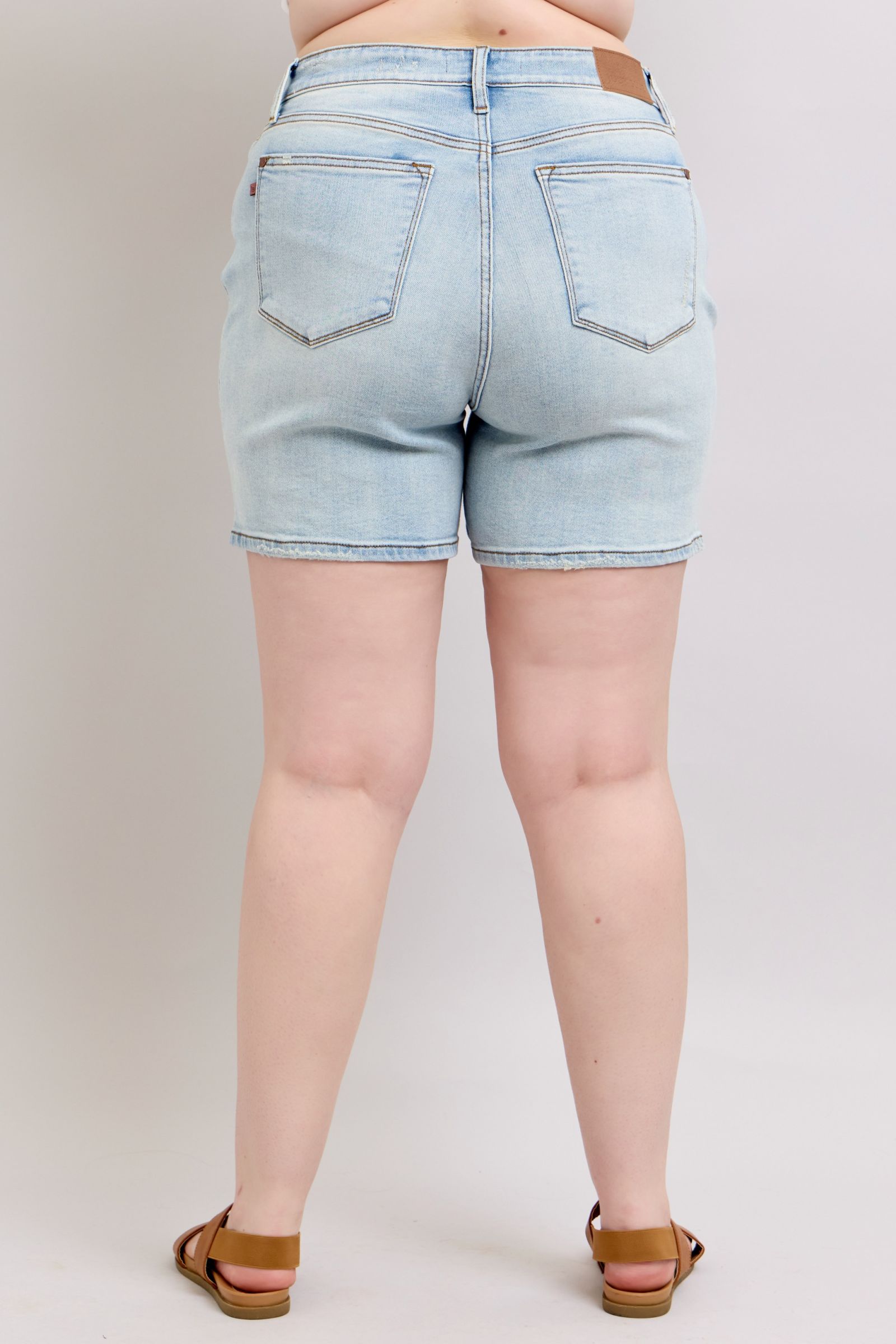 Plus-size full-length 2-button denim shorts with pockets, designed for comfort & casual summer style.