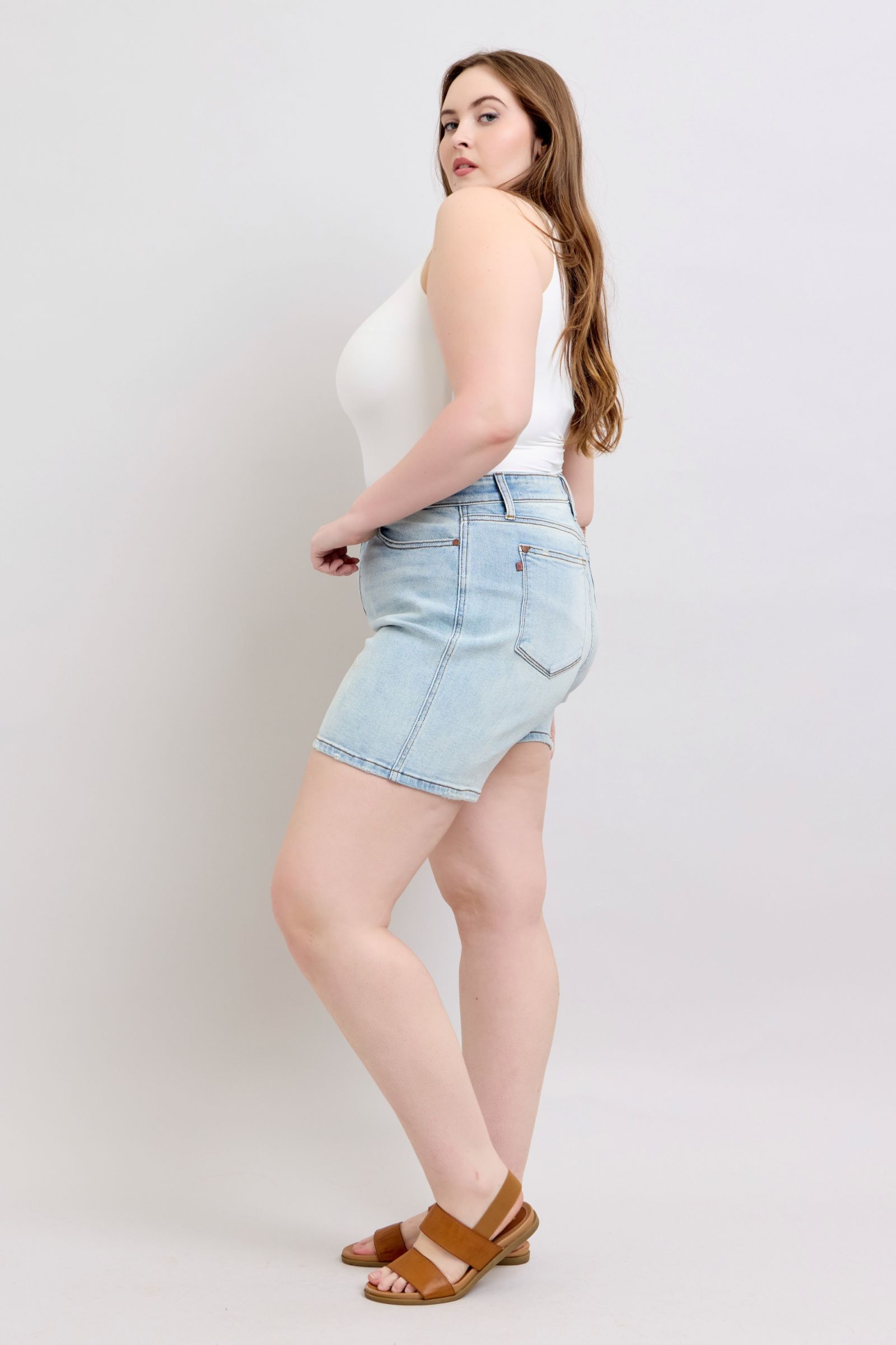 Plus-size full-length 2-button denim shorts with pockets, designed for comfort & casual summer style.