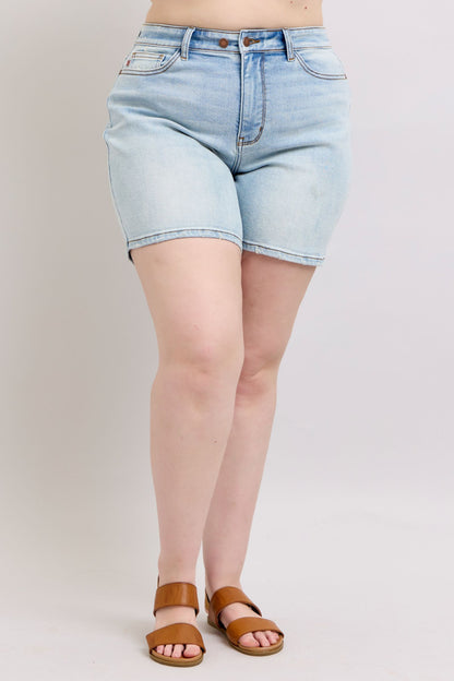 Plus-size full-length 2-button denim shorts with pockets, designed for comfort & casual summer style.