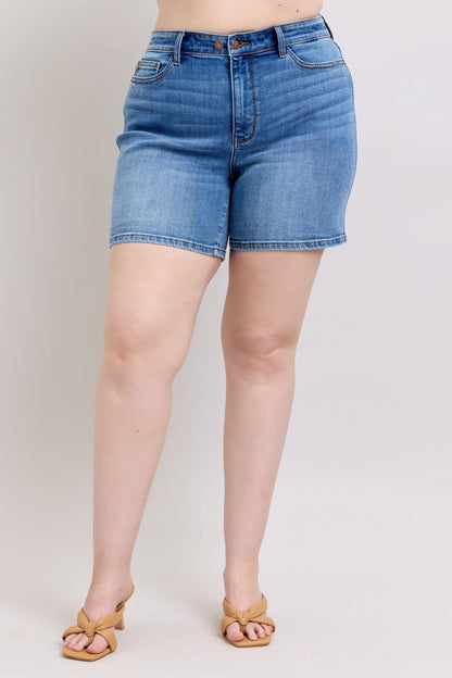 Full-size 2-button denim shorts with pockets, featuring a high-rise waist & moderate stretch for a comfortable & stylish summer look.