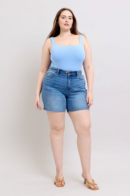 Full-size 2-button denim shorts with pockets, featuring a high-rise waist & moderate stretch for a comfortable & stylish summer look.