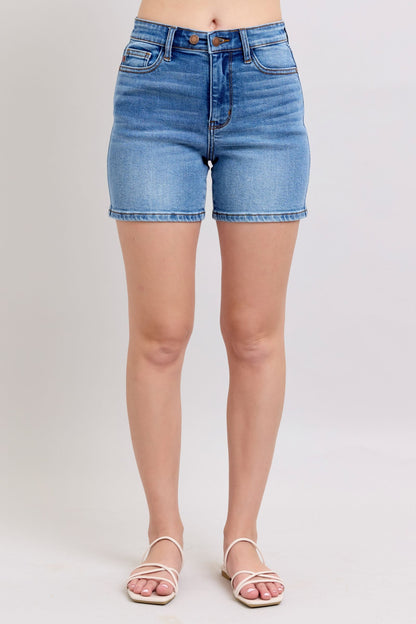 Full-size 2-button denim shorts with pockets, featuring a high-rise waist & moderate stretch for a comfortable & stylish summer look.