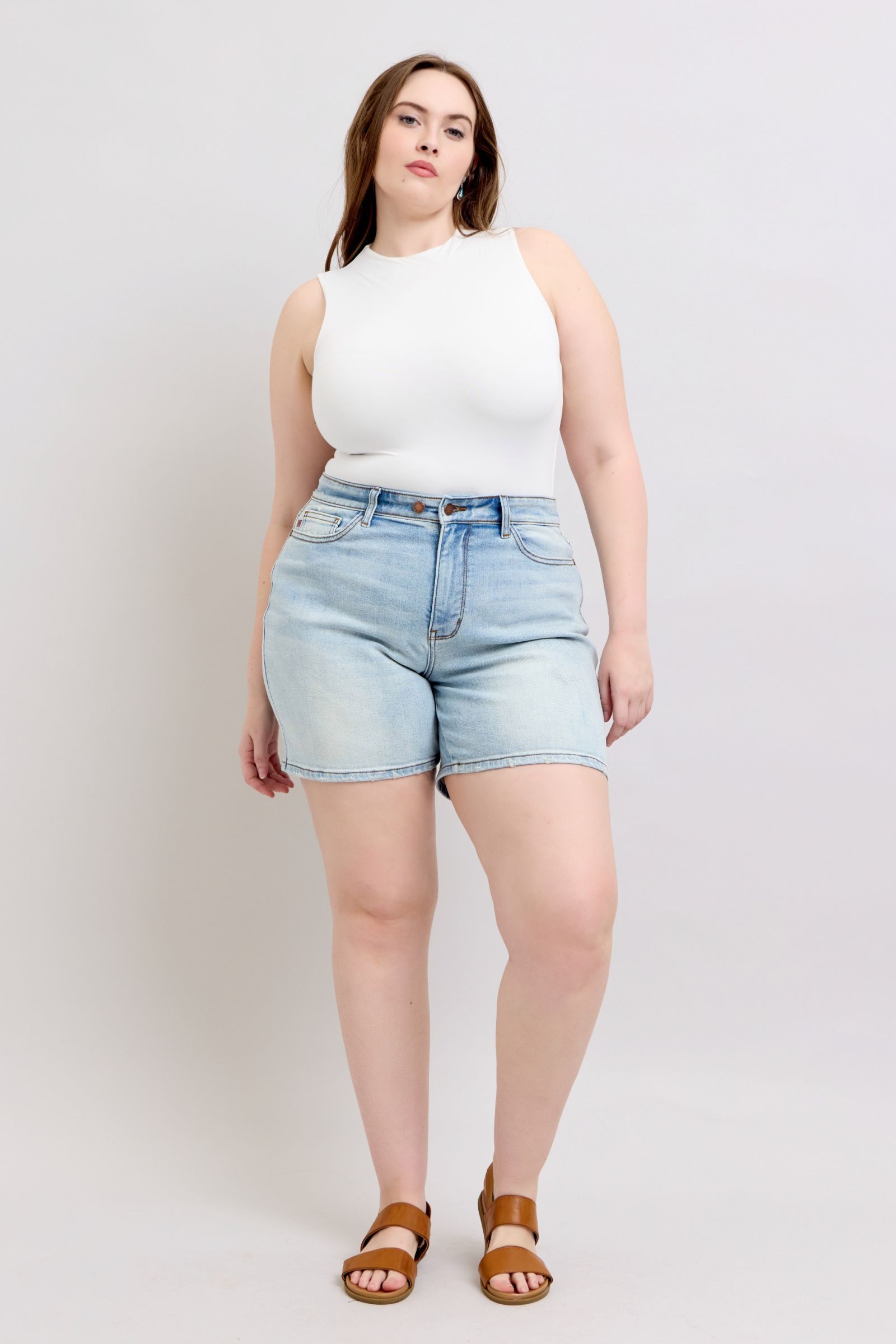 Plus-size full-length 2-button denim shorts with pockets, designed for comfort & casual summer style.