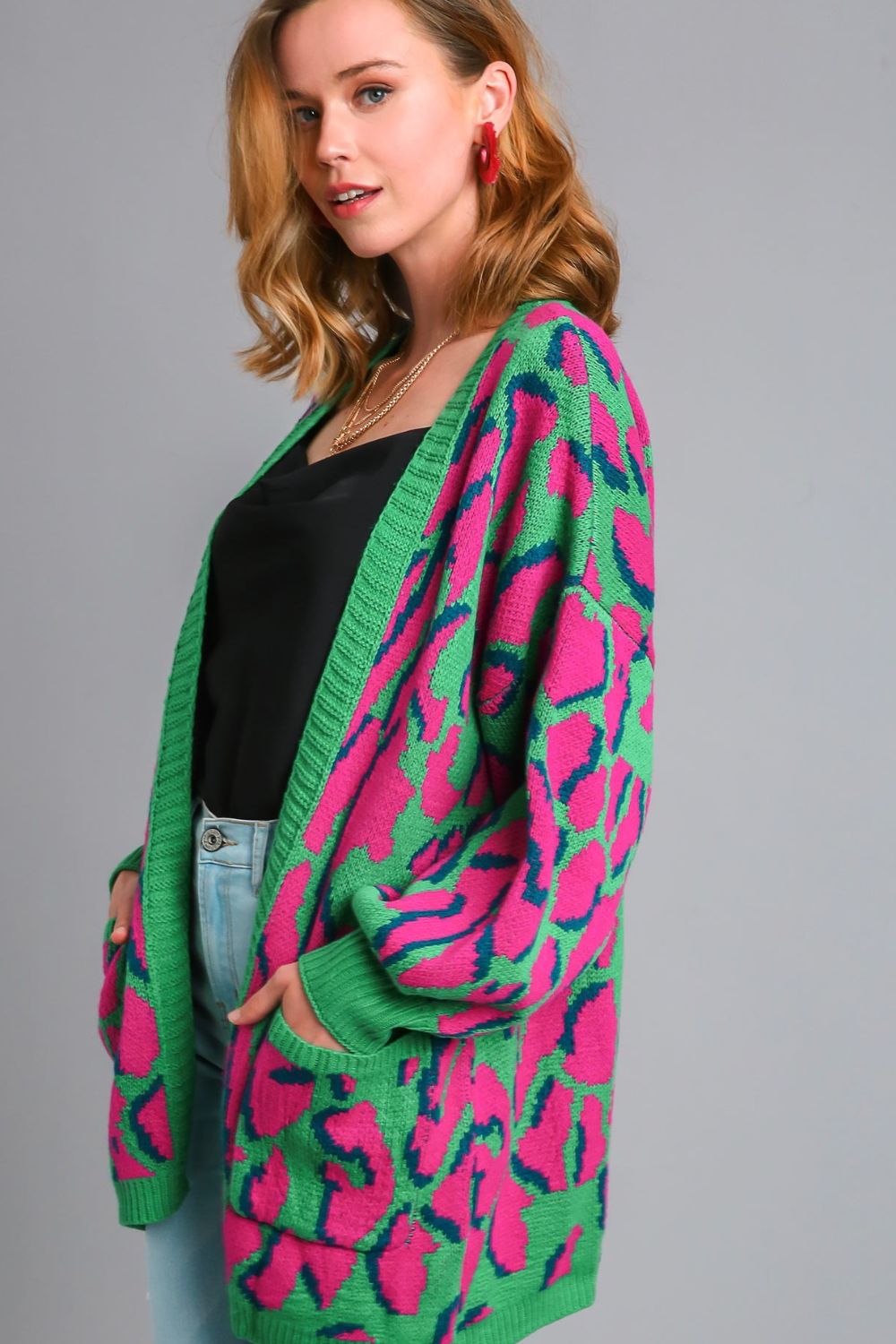 Trendy animal print open front cardigan with side pockets, perfect for layering and a stylish, cozy look.