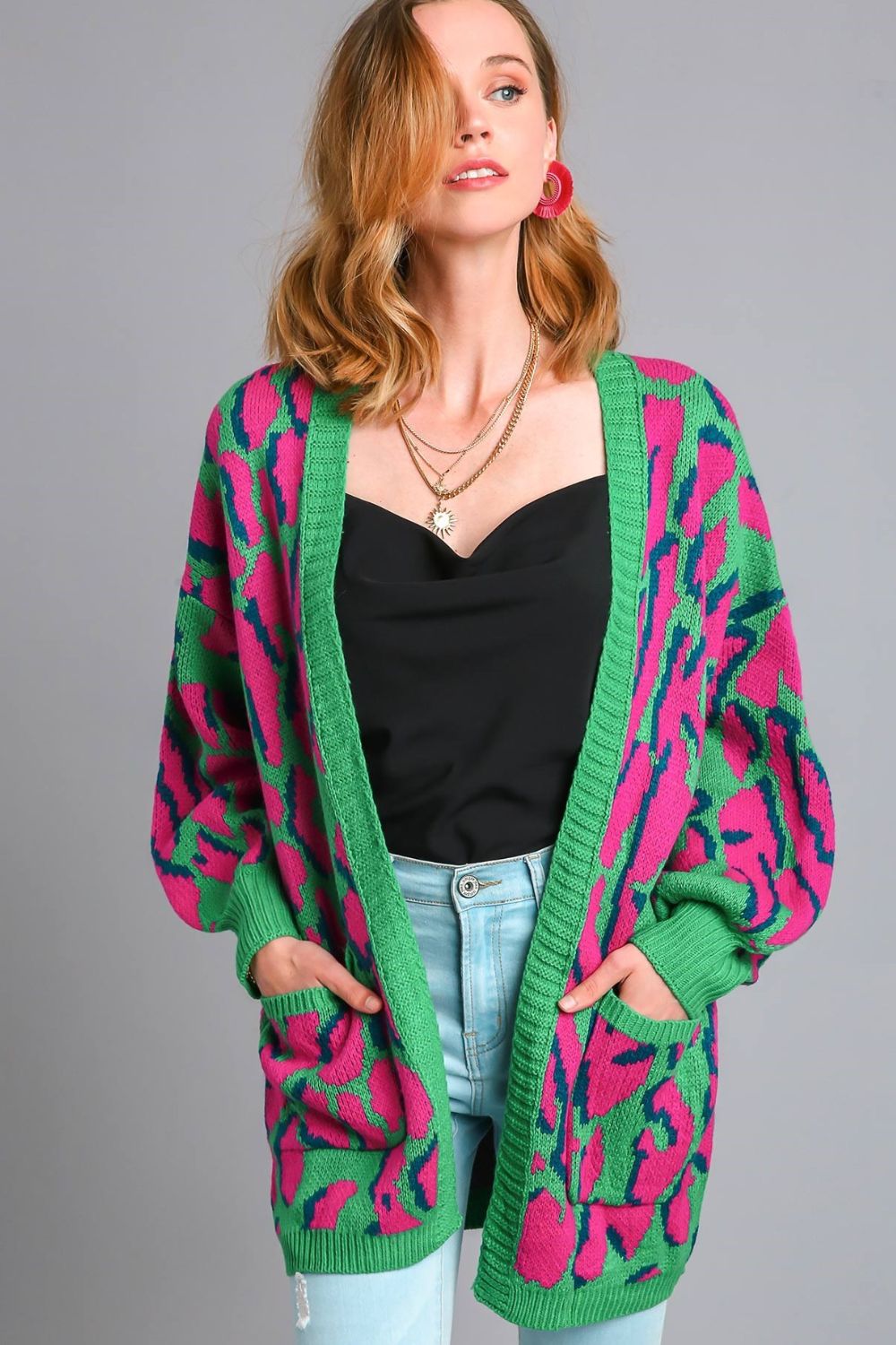 Trendy animal print open front cardigan with side pockets, perfect for layering and a stylish, cozy look.