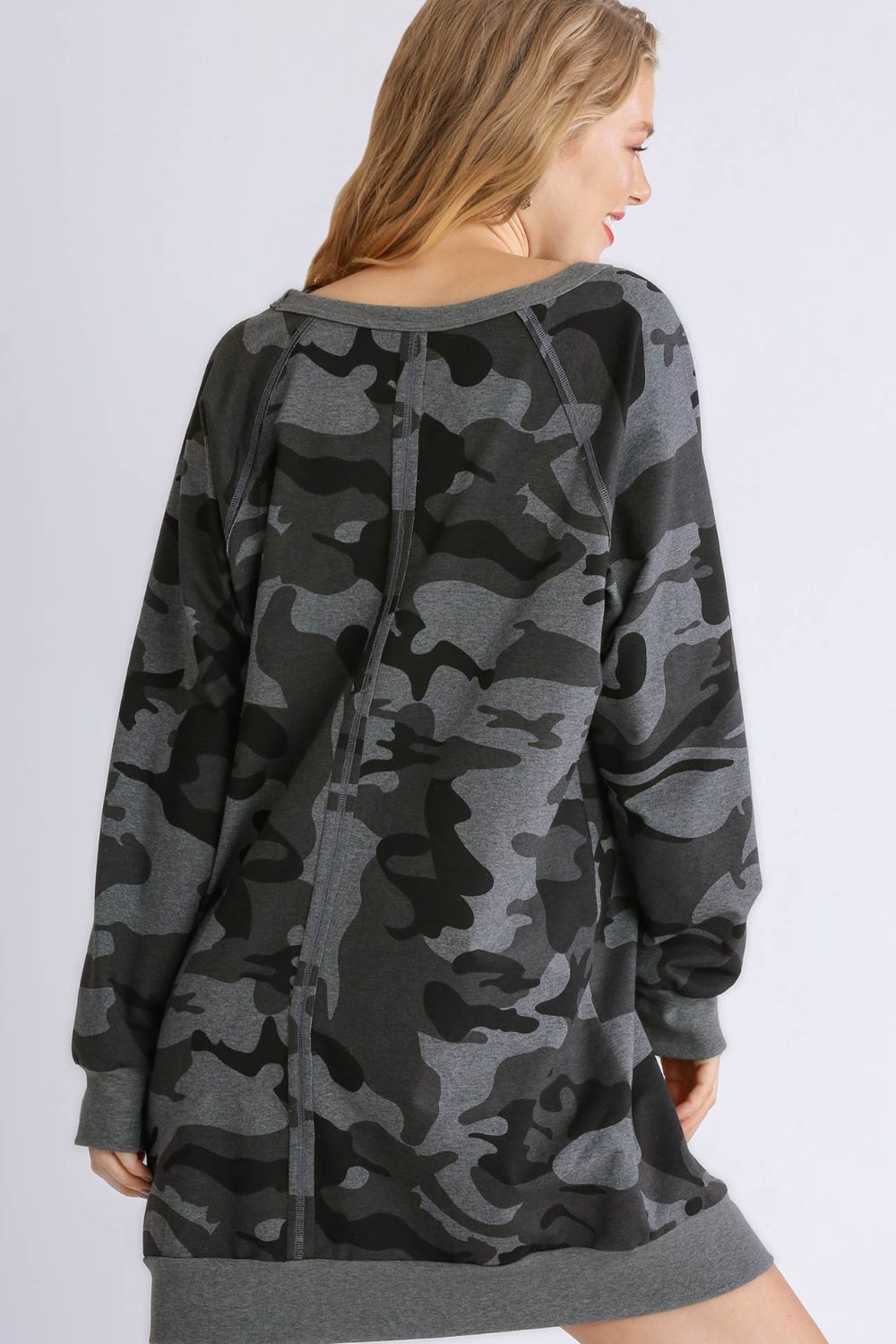 Stylish camo print French terry mini dress with ribbed hem detailing for a trendy and casual look.