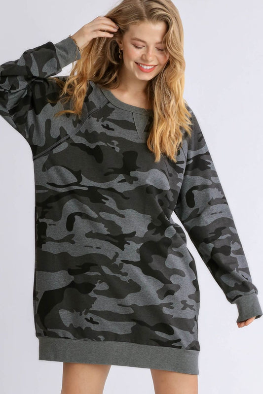 Stylish camo print French terry mini dress with ribbed hem detailing for a trendy and casual look.