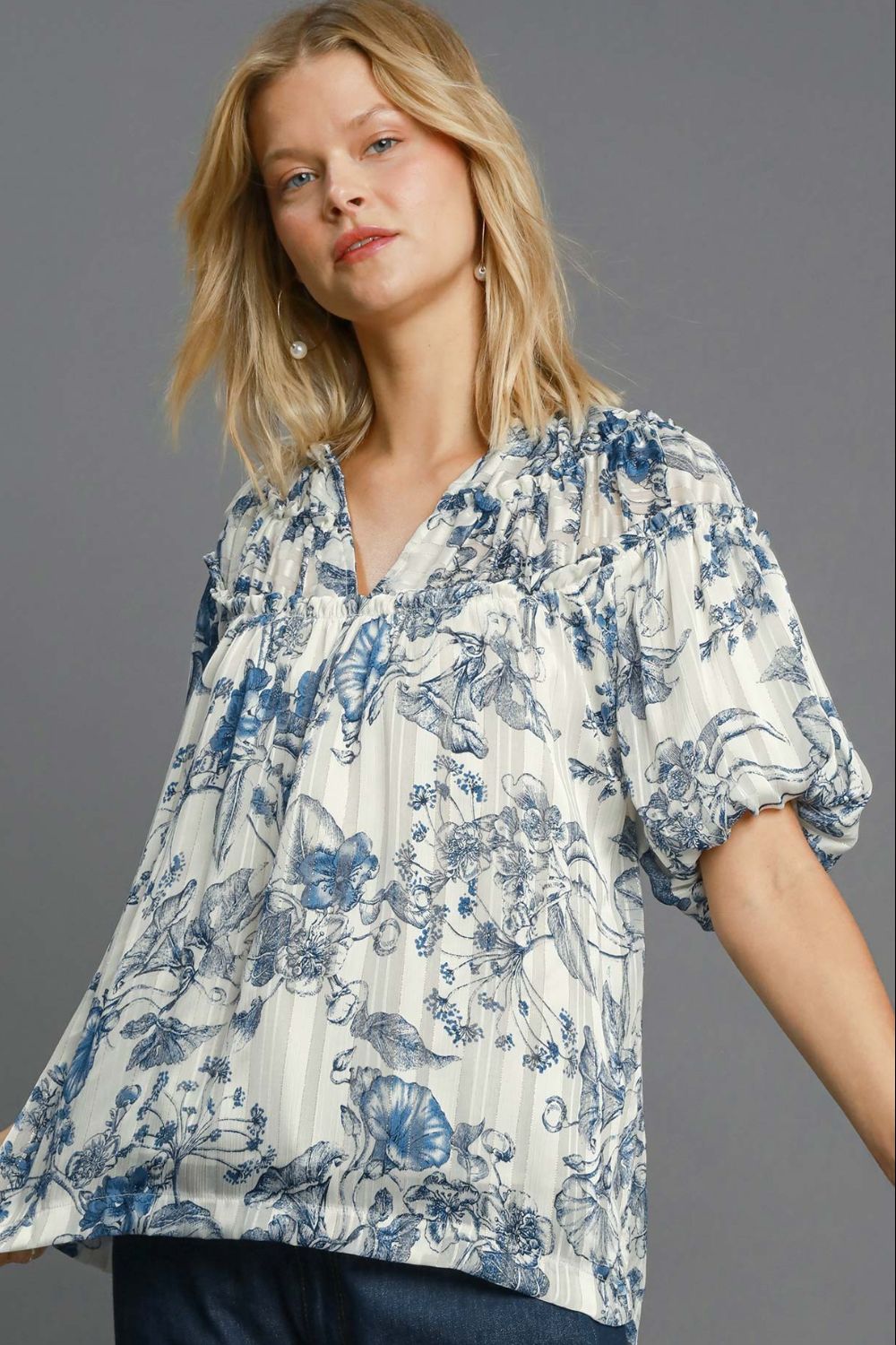 Stylish floral print metallic ruffle blouse with a glamorous and feminine design, perfect for elegant and versatile outfits.