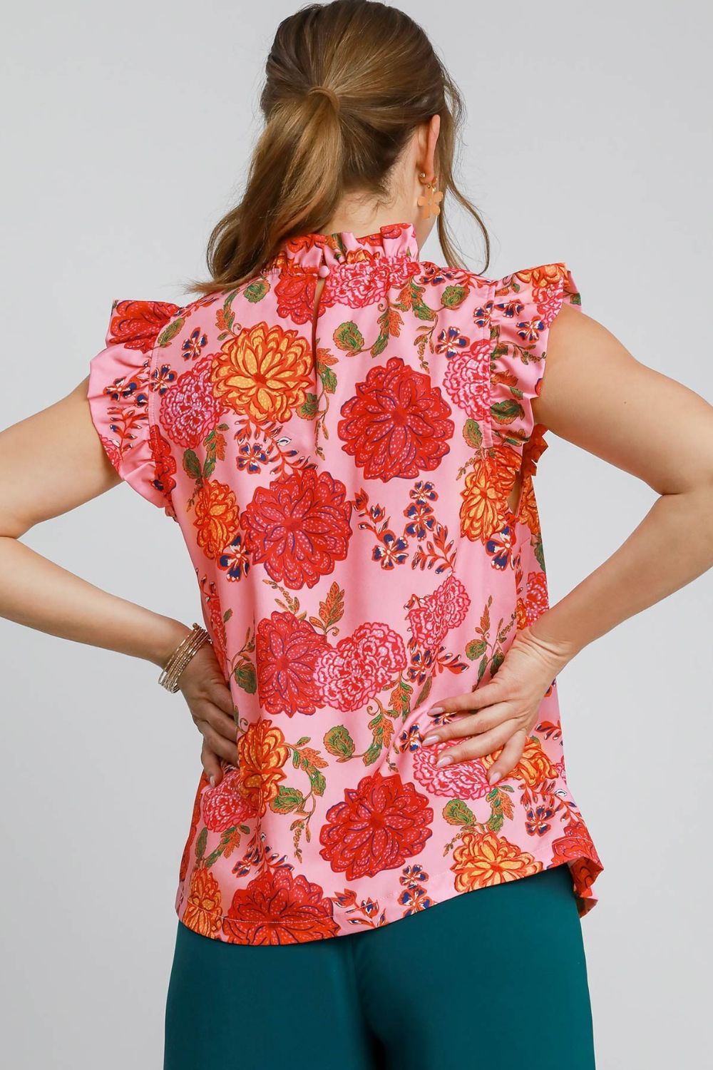 Elegant plus size floral print blouse with ruffled cap sleeves, perfect for a feminine and stylish look.